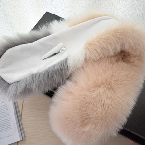 Contrast faux fox fur scarf in grey and beige with soft texture and secure clip closure