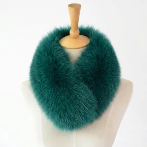 Three-color faux fox fur scarf in white, black and gray on a wooden display stand