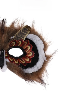 Detailed close-up of textured faux fur and colorful feather patterns on owl costume mask