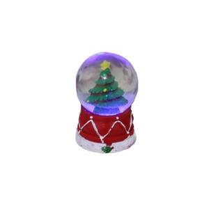 Glowing Christmas tree crystal ball decoration with red base and purple LED lighting