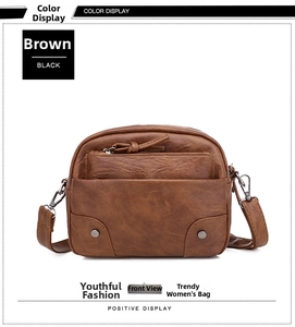 Détail de face d'un sac bandoulière vintage en cuir PU marron avec fermeture éclair et clous