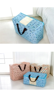 Detail of printed 600D Oxford fabric storage bag with clear window and handles