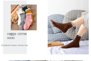 Detail of combed cotton socks featuring pearl lace trim and ribbed texture in pastel colors
