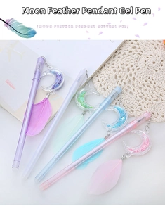 Close-up of four aesthetic gel pens with moon sequins and feather charms in pastel colors