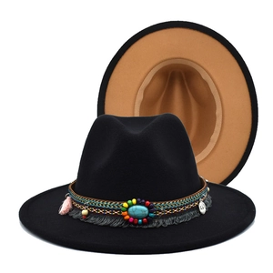 Detail of vintage wool fedora with ethnic beaded band and turquoise stone embellishment
