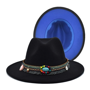 Detail of black fedora hat with blue brim underside and ethnic beaded turquoise band
