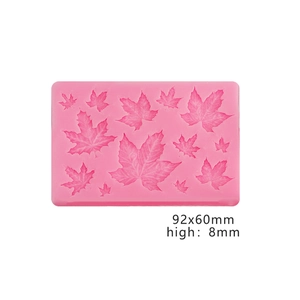 Detailed pink silicone mold for maple leaf shapes measuring 92x60mm for baking and DIY
