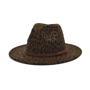 Detailed view of leopard print fedora hat with brown braided leather decorative band