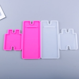 Detail of four-piece DIY silicone resin molds for creating custom mobile phone stands