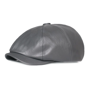 Side view of dark gray faux leather newsboy cap with detailed vintage texture