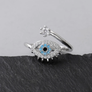 Minimalist evil eye adjustable open ring with blue stone and zirconia details