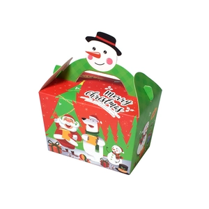 Red and green Christmas gift box with festive illustrations and snowman handle
