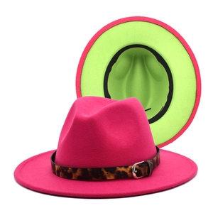Detail of hot pink wool fedora with green contrast brim and leopard print band
