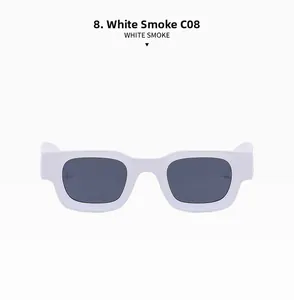 Detail view of vintage white rectangle frame sunglasses with dark grey lenses C08