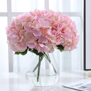 Pink faux hydrangea artificial silk flower bouquet in glass vase for home decor