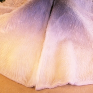 Premium purple and white gradient faux fur Christmas tree skirt with plush texture