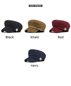 Four color options of tweed baker boy caps featuring woven bands and metal buttons