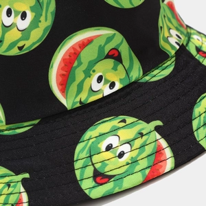 Close-up of watermelon cartoon pattern and detailed stitching on black cotton bucket hat