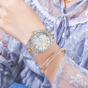 Elegant gold and silver rhinestone watch set with matching slim diamond bracelet for women