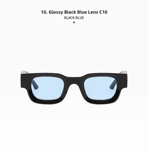 Detailed macro view of square black frame sunglasses with light blue transparent lenses