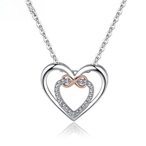 Detailed close-up of a silver hollow heart necklace with infinity symbol and white zircon