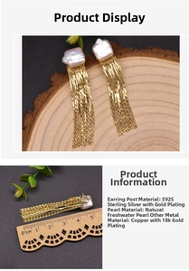 Detail of s925 silver long tassel earrings with baroque pearls and gold plating
