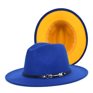 Detail of two-tone fedora hat in royal blue and lemon yellow with leather belt buckle