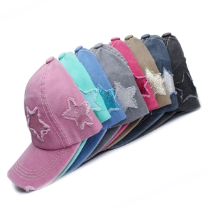 Detailed grid of distressed baseball caps in eight colors with glittering star patches