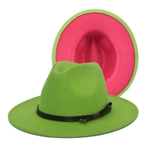Neon green fedora hat with fuchsia interior and black leather band with silver buckle