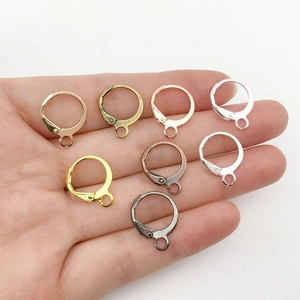 Assorted circular French ear wire hooks in gold silver and bronze metal finishes