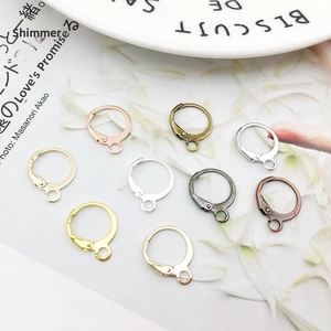 Macro shot of assorted lever-back earring hooks in diverse metallic finishes for DIY jewelry