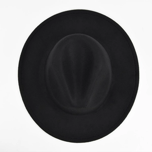 Top-down view of black wool jazz hat showing flat brim and premium fabric texture