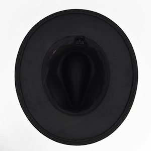 Detailed interior of black wool felt fedora showing 100% polyester lining and size 57 label