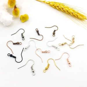 DIY earring hooks set in gold, silver, rose gold and bronze finishes on white background
