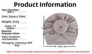 Detailansicht der rosa Baby-Turban-Mütze mit Knotendesign und weicher Baumwollstruktur