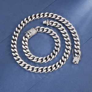 Silver Cuban link chain necklace and bracelet set with iced out diamond clasp