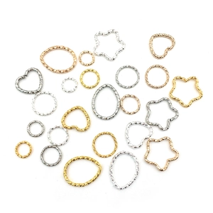 Assorted geometric metal DIY earring charms in gold and silver with textured finish