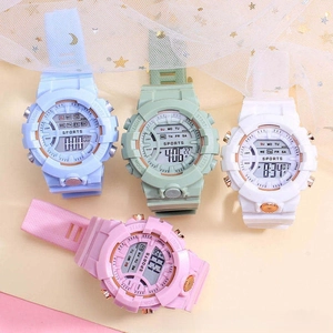 Macro detail of macaron-colored digital sports watches on star-patterned mesh background