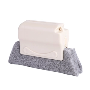 Window groove cleaning tool with ergonomic handle and grey scouring pad on white background