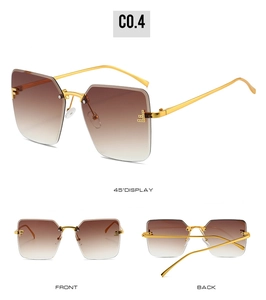 Detailansicht der übergroßen randlosen Verlaufs-Sonnenbrille mit goldenem Metallrahmen
