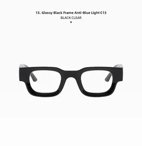 Detail of bright black square sunglasses frame with clear anti-blue light lenses