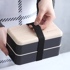 Japanese style double-layer bento lunch box with wood grain lid and black elastic strap