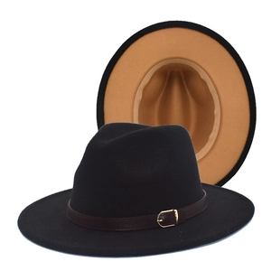 Detail of wool fedora showing black exterior, camel lining and brown leather band buckle