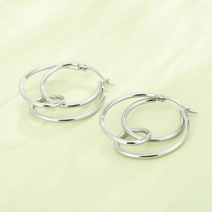 Silver geometric stainless steel triple hoop earrings with interlocked circular rings