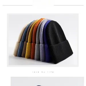 Selection of ribbed knit beanies in various colors including yellow, blue, and black