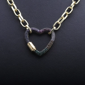 Hip hop cuban link necklace featuring a gold heart carabiner pendant with colored stones
