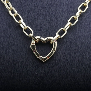 Chunky gold hip-hop chain necklace featuring a colorful zircon-studded heart carabiner