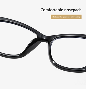Detail showing comfortable integrated nosepads of black cat-eye glasses to reduce pressure