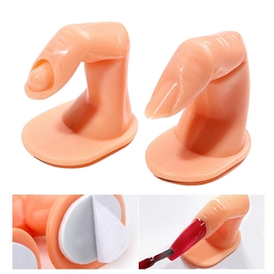 Base per dita da pratica nail art con adesivo che mostra il dettaglio del fissaggio