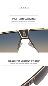 Detail of shield-shaped 3D pattern carving on the golden metal bridge of the sunglasses